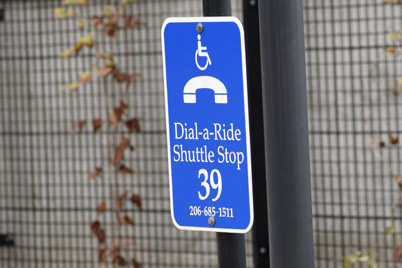 blue dial-a-ride shuttle stop 39 sign