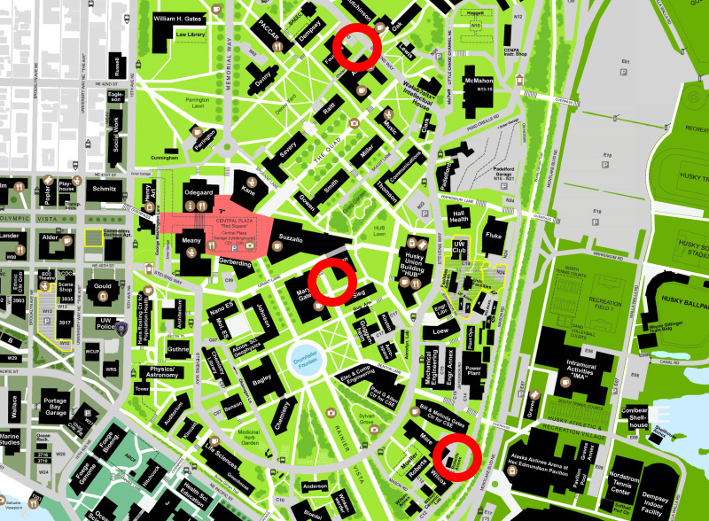 A map image of the University of Washington with red circles over the three new bike house locations