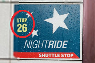 nightride shuttle stop metro bus signage sticker for stop 26 with a red circle showing around stop number