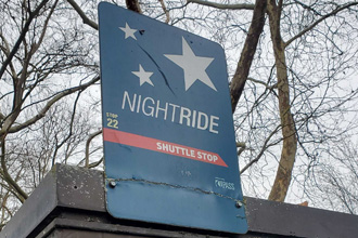 nightride shuttle stop sign at stop 22 flagpole stop