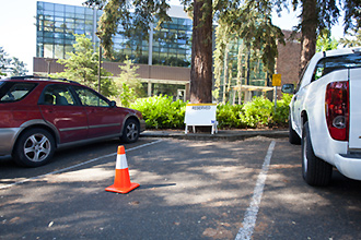 parking space with a safety cone in it