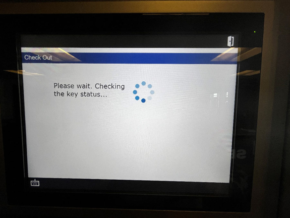 key manager kiosk screen showing please wait...checking out the key status message