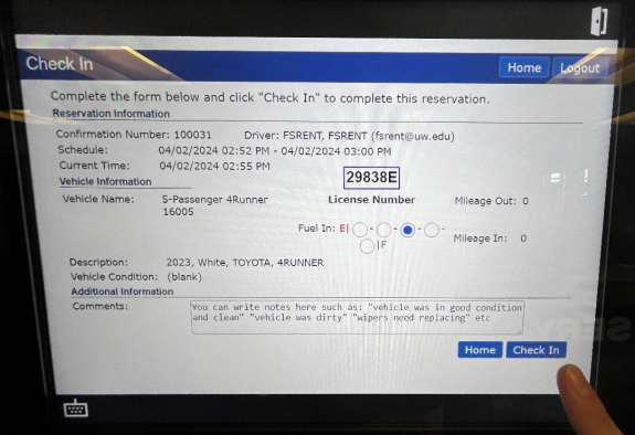 check in screen listing the details of the reservation and a set of radio buttons for fuel level with five levels from E to F and person's finger ready to tap check in button