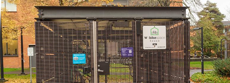 bike lockers stored inside a covered and locked bike house