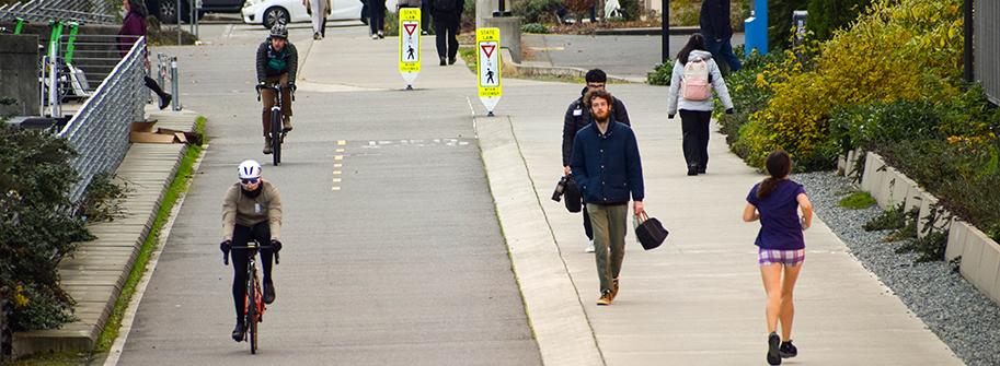 people walking and biking on the Burke Gilman trail